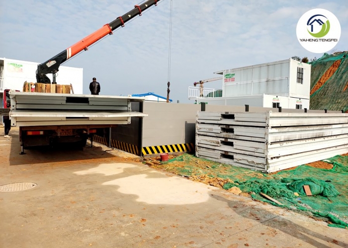 Temporary site accommodation comprising 108 folding prefabricated buildings