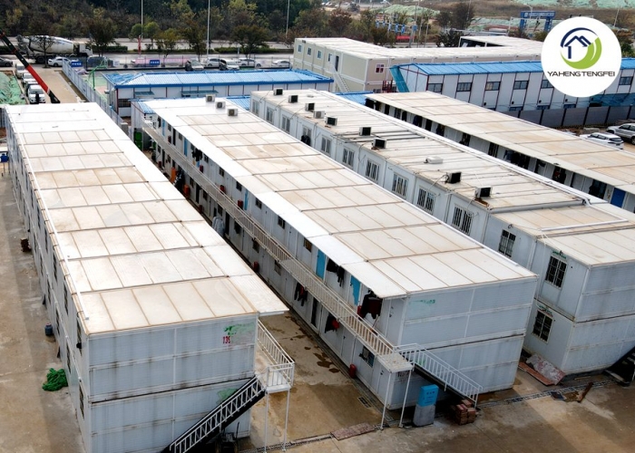 Temporary site accommodation comprising 108 folding prefabricated buildings