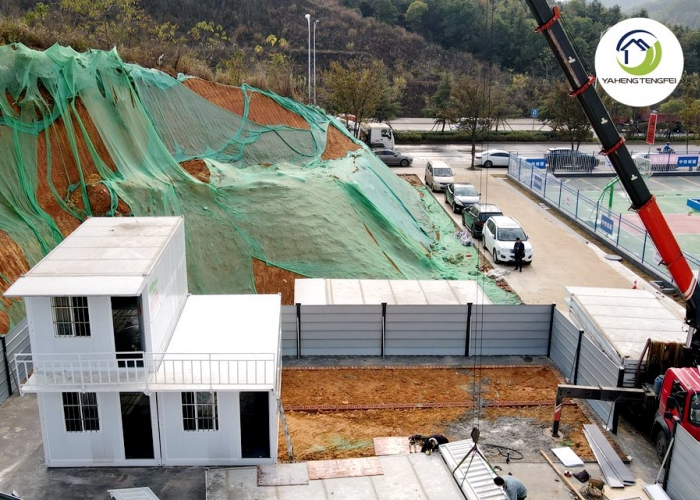 Temporary site accommodation comprising 108 folding prefabricated buildings