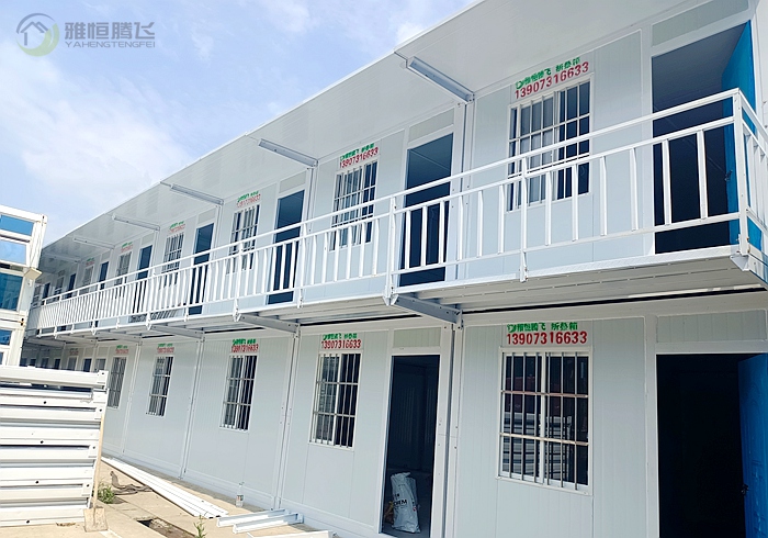Foldable container housing