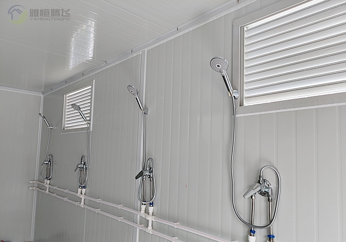 Foldable Container Housing with Customizable Bathroom and Shower
